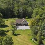 Welcome to 209 Gregory Rd, a contemporary spacious newer-construction home designed for entertaining on 6.5 private acres in the countryside of Sullivan County being sold fully furnished! 209 Gregory offers three bedrooms on the main level, two full bathrooms (including one in the primary), a stylish kitchen with stainless steel appliances and breakfast bar, a great room with fireplace, formal dining area and Wi-Fiâ€“enabled ductless AC units. The loft features an impressive recreation room with a bar, and the full unfinished basement provides abundant storage with a generator hookup. Out back, enjoy Trex decking with hanging lights and a fire pit. This turn-key property has everything you need for quality country living in walking distance to Swinging Bridge Lake with local marinas for boating, close to Highway 17, and just 90 minutes north of NYC.