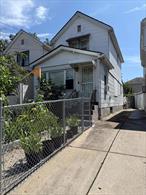 BEAUTIFUL ONE FAMILY 3 BEDROOMS AND 3 BATHROOMS WITH A FULL BASEMENT WITH AN OUTSIDE ENTRANCE .