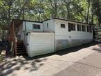 Cute ranch features large eat in kitchen, a short distance to beach, close to Splish Splash water park, Atlantis Aquarium, Golfing, Horseback Riding, Fresh Local Farm Stands, Tanger Outlet Shopping, Wineries, & of Course the main attraction is the Beach! NYC only 1 Hour & 15 Minute Ride makes this the ideal vacation spot on Long Island. SEASONAL ONLY COMMUNITY OF WOODCLIFF PARK OPEN APRIL 15-OCTOBER 15th. LAND IS LEASED AT APPROX 8k annually. CASH ONLY SALES