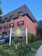 This charming three-story brick building in a sought-after Bayside neighborhood offers a prime location near transit, schools, shopping, dining, and parks. Perfect for first-time buyers or investors, it features low taxes and common charges in top-rated District 26, home to Blue Ribbon schools like PS46, IS74, and Cardozo High. The bright unit includes hardwood floors, a spacious living room, generous bedroom, and in-unit washer/dryer. Step outside to your private access to a beautifully landscaped backyard, perfect for relaxing or entertaining. A rare opportunity to own in a convenient, well-maintained communityâ€”ideal for living.