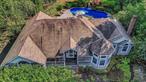 Top Quality custom built home built on a secluded one acre shy parcel in the Great Rock Golf Neighborhood. Chef&rsquo;s kitchen with powered Center Island for seating and prep, full pantry, decorative top quality cabinets, all granite with high end appliances including built in Sub-Zero Refrigerator, Jenn Air Stove, KitchenAid Dishwasher, Franke filtered instant hot and more. Large Formal Dining Room closed off by pocket doors, and entrance foyer with vaulted ceilings. Cozy living room wired for surround sound with open floor plan, full same level laundry room. Full wet bar and Billiard room with plenty of seating, wired for surround sound and a full bathroom. Huge Master BR suite with giant walk in custom closets, and Master Bath with enclosed glass enclosed steam room / multiple head shower with seating bench and a separate whirlpool bath. Oversized bedrooms, one converted to office space with built in oak shelving and decorative walls. Large premium Anderson windows with window treatments included. Backyard paradise with a stream that leads to a 6ft. waterfall and salt water heated pool, giant paver patio and outdoor kitchen with room for expansion. All custom Cast landscape lighting throughout the property. Private front yard with the house set back among gardens. Long Private Driveway with paver apron leading to a liberally lit and finished three car garage with additional workspace, and walk in entrance to partially finished basement with plenty of storage room, closets everywhere. Unfinished portion has storage, Two Year Old Oil Burner and indirect HW Heater, w/ two oil tanks. Door and Staircase leads to an unfinished walk-up attic, able to be finished for additional rooms. Rheem 4 ton Central Air Conditioner, Security system with built in cameras, all clear oak flooring and moldings, recessed lighting throughout the home, with additional built in decorative lighting. Top Quality everywhere.