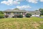 This charming 2-bedroom, 1-bath ranch is nestled on over half an acre in the heart of the Hudson Valley. Built in 1956 and lovingly maintained, this single-story home offers 1, 160 sq. ft. (not including the basement which could be converted into additional living space),  of bright, cozy living space, perfect for first-time buyers, downsizers, or weekenders seeking a peaceful escape.Originally a 3-bedroom (and could easily be converted back to a 3 bedroom), the third bedroom was thoughtfully converted into a formal dining room, adding flow and character to the main living space. The closet remains, allowing for an easy conversion back to a third bedroom if desired.Property Details:2 Bedrooms  1 Full Bath1, 160 sq ft  .58 Acres (25, 265 sq ft lot)Hot Air HeatingAttached 2-Car GarageEnclosed Porch + Open PorchWallkill School DistrictHighlights:Spacious living area with large windowsFunctional kitchen layout with ample potentialFull basement for storage or future finishingCovered porches for relaxing mornings and golden-hour eveningsFlat, usable yardâ€”perfect for gardening, pets, or entertainingLocated just minutes from New Paltz, Gardiner, wineries, orchards, hiking trails, and commuter routes, yet tucked into a peaceful residential setting.