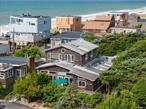 Ideally located just 100 feet from the beach, this spacious, well maintained 4+ bedroom home will check every box on your list! The expanded great room features a wall of windows, wood burning fireplace, and a gourmet kitchen with ample storage and prep space. Rounding out the first floor are 3 bedrooms, 1.5 beautifully renovated bathrooms, an additional flex space, a storage shed, and outdoor shower. Head upstairs to the generously sized primary bedroom which enjoys sweeping ocean views, ample closet space, and a large en-suite bathroom with a shower, soaking tub, and new dual sink vanity. Swim laps in the 33&rsquo; long heated swimming pool. Sunbathe on the sizeable deck surrounded by lush greenery for privacy. Walk 100&rsquo; to Fire Island&rsquo;s world famous, pristine beach for a dip in the Atlantic Ocean, or stroll just 7 minutes to restaurants, entertainment, shopping, and community activities in downtown Ocean Beach. This beautiful home will not last long! Affordable flood insurance, only $1, 430 a year.