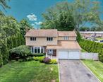 Welcome to 50 Wildwood Ave â€” a beautifully maintained Colonial in the award-winning Half Hollow Hills School District!Parked on a safe, dead-end street, this 4-bedroom, 2.5-bath home sits on a spacious 10, 500 sq ft lot (just under a quarter acre) and offers an ideal blend of comfort, space, and functionality. The second floor features a private primary suite with its own en-suite bathroom, along with three additional well-sized bedrooms.Enjoy an eat-in kitchen, a formal living room, and a cozy den with a wood-burning fireplace that opens directly to a large deckâ€”perfect for entertaining or relaxing in your own backyard retreat. Fully fenced in. The property boasts a semi-in-ground pool and plenty of yard space for gatherings, gardening, or simply soaking up the sun.A finished basement provides versatile space for a home office, gym, or playroom. The two-car garage adds convenience and extra storage, while the homeâ€™s great curb appeal and quiet, commuter-friendly location make it an exceptional find.Close to top-rated schools, parks, shopping, and major highways. Donâ€™t miss your chance to own in one of Long Islandâ€™s most desirable neighborhoodsâ€”schedule your private showing today!