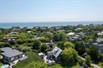 This classic Seaview gem offers a timeless charm with a bright, open layout. The kitchen features a cathedral ceiling and stainless-steel appliances, creating a spacious and inviting atmosphere. Hardwood floors flow seamlessly through the living room, dining area, and all four bedrooms. The home includes one and a half bathrooms, with the full bath recently renovated to add a fresh, modern touch. Two sets of sliding doors open to an expansive deckâ€”ideal for outdoor living, dining and entertaining. There is also mature landscaping creating a serene setting. The home also provides everyoneâ€™s favorite, the outdoor shower. For year-round comfort, this home features split units offering both air conditioning and heat, as well as a cozy wood-burning stove for those cooler evenings. As part of the Seaview community, youâ€™ll enjoy access to outstanding amenities including docking, a childrenâ€™s playground which includes basketball courts and a pool. There are also Tennis courts and a ball field for your enjoyment. Just next door is the vibrant Village of Ocean Beach, home to a variety of restaurants and shops. Homeowners and guests will also appreciate the Ocean Beach Youth Group (OBYG), which offers enriching programs for children during the summer season.