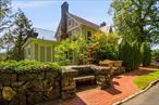 Conveniently located in old Edgemont section, just a few blocks to Scarsdale village, train station, restaurant and shops.Extensively renovated center hall colonial with beautiful architectural design and details. Spectacular views from most windows and outdoor spaces.Stunning indoor and outdoor spaces, open and covered terrace, decks, stone patios with babbling brook, great for entertaining and private use.Elegant and unique one of a kind 1920s stone/stucco/brick home includes 9&rsquo;ceiling on the first floor and coffered ceiling, beautiful oak floors, beautiful marble baths, two fireplaces, entertaining bar, family room to walk out to covered terrace & open terrace, and deck to back yard. Walk down to level backyard. Nicely landscaped garden.