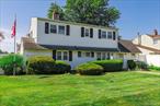 Spacious Corner Property in Prime Levittown Location!Welcome to this beautifully maintained 4-bedroom, 2 1/2-bathroom home situated on a desirable corner lot in Levittown. The thoughtfully designed layout features a ground-floor primary suite complete with a full en-suite bathroom, offering comfort and privacy.Enjoy cooking in the updated eat-in kitchen with granite countertops and stainless steel appliances, perfect for everyday meals or entertaining. The formal dining room with sliding doors opens to a lovely patio, creating an ideal indoor-outdoor flow. Charming wood floors (as seen) and a cozy fireplace add warmth and character to the living space. Additional highlights include a rare 2.5-car garage with loft storage, a 4-car driveway, inground sprinklers, and plenty of room for guests or hobbies. Conveniently located just minutes from schools, shopping, local restaurants, and more.Donâ€™t miss this unique opportunity! More photos coming!!