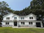 Nestled on an oversized 100x105 lot in the highly sought-after Village of Massapequa Park, this beautiful 5 bedroom, 3 bath home blends timeless craftsmanship with modern comforts. From the moment you step inside, youâ€™ll notice the refined detailsâ€”crown molding throughout, picture frame molding adorning the living, dining room, and both hallway levelsâ€”creating a warm, upscale aesthetic.The heart of the home is a stunning gourmet kitchen featuring stainless steel appliances, a farmhouse sink, pot filler, pantry, and gleaming granite countertops with a custom tile backsplash. Custom built-ins flank a cozy gas fireplace in the family room, making it an ideal spot for entertaining. The formal living room and dining room makes hosting large gatherings ideal.The layout offers flexibility with a first-floor home office or fifth bedroom with a full bath, and a full finished basement for added living space. Upstairs, the luxurious primary suite with tray ceiling boasts a spa-like ensuite with pedestal bath, oversized shower with dual shower-heads, a large walk-in closet, plus 3 additional amply sized bedrooms and convenient second-floor laundry room. Additional highlights include Andersen windows, a full attic for storage, entry chandelier with hoist for easy cleaning and an attached one-car garage.A rare find offering space, style, and locationâ€”donâ€™t miss this exceptional opportunity to own your dream home today in Massapequa Park!