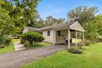 Come home to this well maintained raised ranch style home. Features include Entrance Hall, 3 bedrooms on main floor, hardwood floors, Full finished basement with Outside Entrance. Potential Mother/Daughter with proper permits.
