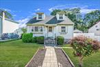 Charming 4-bedroom Cape with detached garage and full basement. This home features 1.5 baths, a spacious layout, and plenty of potential. Conveniently located with room to make it your own