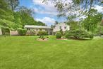 Set on nearly an acre of beautifully landscaped property in a quiet cul-de-sac, this updated four-bedroom, three-and-a-half-bathroom Contemporary split-level home offers bright, open living spaces. Located in the desirable Briarcliff Manor School District, this home is perfect for both entertaining and everyday living. The main level features a spacious living room with a wood burning fireplace, a dining room, and a renovated chefâ€™s kitchen with high-end stainless steel appliances and a convenient eating area. The kitchen opens to a large deck, ideal for outdoor dining. A short staircase leads to the bedroom level, where you&rsquo;ll find a private primary suite with en-suite bath, three additional bedrooms, and an updated hall bathroom. A short staircase leads to a family room, full bathroom, and an office. The partially finished basement includes a large recreation room and a large storage/utility room. Outside, the property boasts a bluestone patio, a storage shed, multiple seating areas, and plenty of space for play. This home combines comfort, style, and a prime locationâ€”perfect for easy living in the coveted Briarcliff Manor community.