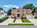Stunning 2021-Built Colonial in East Meadow.Welcome to this exceptional Brick home featuring 5-bedroom, 4.5-bath situated on an oversized 11000 sqft lot in the heart of East Meadow. Boasting luxury finishes and thoughtful design, this residence offers comfort, elegance, and functionality throughout.Step inside the grand 22-foot entry foyer and experience the beauty of coffered ceilings, gleaming hardwood floors, and designer touches like a crystal chandelier and recessed high hats. The spacious layout includes a formal living room, dining room, and an inviting family room perfect for entertaining.The chefâ€™s kitchen is a standout, featuring high-end Wolf stainless steel appliances, propane cooking, sleek countertops, and ample cabinetry. A convenient guest or parent suite is located on the first floor, along with a stylish powder room.Enjoy year-round comfort with central air, propane heat, and a Sonos sound system throughout. The property also features a 1.5-car garage, two driveways, an in-ground sprinkler system, and a fully fenced PVC yard. The beautifully pavered patio with a wood-burning fireplace is perfect for outdoor gatherings, and thereâ€™s ample space to add a pool.This turn-key home truly has it allâ€”modern luxury, smart functionality, and room to grow. A rare find and a must-seeâ€”schedule your private tour today before itâ€™s gone!