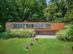 A Masterpiece in Modern Architecture: The Wolfhouse by Philip Johnson.This is a once-in-a-lifetime opportunity to own a piece of architectural history. Set atop a hillside, with commanding panoramic views of the Hudson River, the Wolfhouse is an iconic residence designed by legendary architect Philip Johnson circa 1950.Meticulously restored to its original condition in 2020, the home effortlessly blends museum-quality design with contemporary livability. The 4-bedroom, 3-bath residence features oversized plate glass windows, an open-concept floor plan, a working fireplace, and a central courtyard that dissolves the boundary between indoors and out. White oak floors bring a sense of natural elegance, while the updated kitchen bridges modern style with warm mid-century character. Kitchen upgrades include Wolf/Subzero appliance package and custom USM modular cabinetry. Set on 1.4 acres, the property offers privacy, scale, and a profound connection to its natural surroundings. This sun-filled home offers spectacular views of the Hudson River and the Newburgh-Beacon Bridge.The Wolfhouse also presents a rare opportunity for investment-minded buyers: Commercial shoot income potential of $15, 000â€“$35, 000/day + Short-term rental income averaging $1, 250/night.Whether as a full-time residence, creative retreat, or strategic investment, this extraordinary property stands as a timeless tribute to one of Americaâ€™s most influential architectsâ€”and a bold expression of modern living in the Hudson Valley. Own a landmark. Live in a legacy.