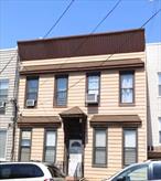 4 Family home; all 4 apartments consist of 2 bedrooms and 1 full bath each.