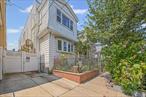 Welcome to this well-maintained semi-attached two-family residence on a charming tree-lined street in desirable Cityline Brooklyn, perfectly positioned at the Brooklyn-Queens border. This exceptional property offers six bedrooms and two full bathrooms across two spacious units, plus an additional finished room and bathroom in the walk-out basement.The home showcases beautiful hardwood floors throughout and with updated kitchens and bathrooms. What truly sets this property apart is its impressive array of premium systems, including solar panels with five years remaining on the lease, dual heating systems with an energy-efficient Navient tankless boiler, and over ten ductless mini-split units providing individualized climate control. The Nest smart thermostat system and separate utilities with dual meters enable independent living arrangements.Practical conveniences include a private shared driveway with garage, and as an owner-occupied home, there are no tenant complications. The location offers excellent transportation options just steps from Atlantic Avenue, with quick access to JFK Airport via Conduit Boulevard and easy Long Island connections.This rare find combines Brooklyn charm with Queens convenience, making it ideal for multi-generational families, investors, or owner-occupants seeking rental income potential.
