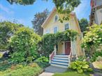 Welcome to this beautifully maintained 2-Family home on the sought-after South Side of Poughkeepsie, currently used as a spacious and elegant single-family Colonial Victorian. Offering 2, 170 sq ft of living space with an additional 352 sq ft in the walk-up third-floor attic, this 4-5 Bedroom, 2 Full Bath home blends timeless charm with modern convenience. From the moment you arrive, you&rsquo;ll be drawn in by the inviting wraparound front porchâ€”perfect for morning coffee or evening relaxation.Inside, original architectural details like pocket doors, wood trim, and high ceilings speak to the homeâ€™s rich character, while its turnkey condition ensures a move-in-ready experience. The layout offers generous room sizes, ideal for both everyday living and entertaining. The tranquil, fully fenced backyard provides a peaceful, park-like settingâ€”an oasis for gardening, outdoor dining, or simply unwinding.Situated on a quiet, tree-lined one-way street with off-street parking for two cars, this home offers privacy and serenity while being just minutes from the vibrant heart of Poughkeepsie. Enjoy close proximity to Vassar College, including its cultural events, library, and scenic Vassar Farm trails. Also convenient to the Poughkeepsie Metro North & Amtrak train stations, Route 9 shopping and dining, the Poughkeepsie Galleria, and the Mid-Hudson Bridgeâ€”making commuting and errands a breeze.Whether you&rsquo;re looking for a character-filled single-family residence or want the flexibility to convert back to a 2-family investment property, this home presents a rare and valuable opportunity in one of Poughkeepsieâ€™s most desirable neighborhoods.