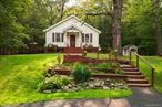 New Photos on the WAY!Charming Historic Schoolhouse with Lake Views. Step back in time with this beautifully restored one-room schoolhouse, an ideal haven for history buffs and lake lovers alike. Nestled into a gentle hillside on a peaceful two-acre lot, this home features a flat lawn, a semi-circular driveway, and multi-level decking that connects effortlessly to both the main living space and the primary bedroom. Start your day or wind down in the evening on the classic rocking chair porch, where you can take in views of Swinging Bridge Reservoir. Inside, you&rsquo;ll find two bedrooms, one and a half baths, and a spacious walkout basement perfect for a rec room, studio, or guest space. Modern updates include a lovely kitchen, renovated bathrooms, a warm and inviting living area, and abundant storage with thoughtfully designed closets. Public access to Swinging Bridge Reservoir is just down the street, and youâ€™re only minutes from Bethel Woods Center for the Arts. Short-term rentals are permitted, making this not only a wonderful retreat but also a great investment opportunity. Donâ€™t let another summer pass you by without experiencing life on the lake. Call today for your private tour.