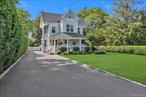 Step into the charm and character of 1881, beautifully reimagined for modern living. This extraordinary Colonial, located in the heart of South Sayville, was completely gutted to the studs and tastefully renovated in 2015 to preserve its original architectural details while offering every contemporary convenience. Rich custom moldings, original hardwood flooring, carefully restored period cast iron radiators, and high ceilings honor the home&rsquo;s storied past while elevating everyday living. The trek front porch faces east and greets you with a beautiful sunrise with drenched light through out the house during the day. The first floor is thoughtfully designed for both grand entertaining and cozy moments at home. Upon entry, you are greeted by a charming living parlorâ€”an ideal space for welcoming guests or quiet reflection. Off to the right, the home opens into a beautifully connected living room, highlighted by a grand and noteworthy staircase. Both the living room and formal dining room are linked by a wide, open transition space, creating a sense of seamless movement. At the heart of the home is a sun-drenched dream eat-in chefâ€™s kitchen adorned with Carrara marble, a large center island, wet bar, stainless steel appliances, pantry, hardwood flooring, recessed lighting, high ceilings and French doors that open to backyard. Enjoy the convenience of a back staircase leading to the second floor, where youâ€™ll find four bedrooms, including a sunlit primary suite with a walk-in closet and private full bath. A second full bathroom serves the remaining three bedrooms. Ascend another flight of stairs to the delightful â€œGranny Atticâ€â€”a wonderful large with abundant space with endless potential- office, guest suite, or creative retreat. Outside, enjoy a large deck for al fresco dining, a stone patio for relaxing evenings and watching the sun set, and your very own tennis and pickle ball court for daily recreation. Ideally located near Sayville Beach, Port Oâ€™ Call for sailing lessons, scenic walking/biking paths, and playgrounds. Just a short stroll to Main Street offers access to charming shops, local favorites and concerts at the Common Ground. This home is more than a residenceâ€”itâ€™s a lifestyle. A perfect blend of elegance, comfort, and location.