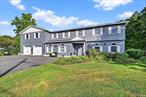 Welcome to this beautifully maintained 5-bedroom, 4.5 bath located on a quiet country road in New Hampton, NY- within the Goshen School District. Thoughtfully designed for comfort and functionality, this home is ideal for large or extended family living. Just 60 minutes from NYC youâ€™ll enjoy proximity to schools, shopping and restaurants.Step into this bright open concept living room and dining room area featuring hardwood floors and an abundance of natural light. The entertainerâ€™s kitchen is complete with stainless steel appliances and two granite islands with ample cabinetry for storage.Off the cozy family room, French doors lead to a freshly painted, extended bi-level deck, perfect for indoor-outdoor living, entertaining or relaxing with nature. Enjoy the first floor master suite featuring privacy and flexibility for multigenerational living. This master includes an upgraded en-suite bathroom, spacious closet and its own heating zone. Upstairs, youâ€™ll find four generously sized bedrooms, hardwood floors with a skylit hallway and ample storage space. The second-floor master suite includes a private bath, a grand walk-in closet with a dressing area. This suite also offers direct access to the newly renovated recreation room located above the garage, flooded with natural light and a complete private entrance-perfect for a potential gym, media room or home office. This oversized, two-car garage features blown-in insulation for energy efficiency and exceptional storage space.The fully finished basement includes a sizable playroom with a full bath, quiet home office space and an additional bonus room. Thereâ€™s also a dedicated dry storage room to keep seasonal items safe and organized. Additional highlights include a paved driveway that can fit 8-10 cars, updated roof and siding (2022), a separate electrical panel wired for a generator and wiring in place for a future outdoor pool.This move-in ready home is truly a must-see! Schedule your private tour today and experience the best of Hudson Valley living!!