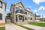 Step into luxury living with this stunning, newly built 2-story brick home that perfectly balances modern elegance and everyday comfort. Located just moments from the A train and Resort World Casino, this home offers unbeatable convenience alongside style. Designed with thoughtful details, it features in-unit laundry on both floors, making it ideal for multi-generational living or added everyday ease. The expansive open concept kitchen flows seamlessly into the dining and living areas, creating a perfect space for entertaining or relaxing. Upstairs, you&rsquo;ll find a private third-floor master suite offering a peaceful retreat with added privacy and comfort. Enjoy energy efficiency with solar panels, along with central air conditioning and heating for year-round comfort. The massive cellar or basement offers endless potential, whether used as a gym, media room, or creative space. A private driveway and garage ensure stress-free parking. With easy access to buses, trains, and major highways, commuting is a breeze. The seller is also open to offering flexible terms or concessions, making this an exceptional opportunity you won&rsquo;t want to miss.