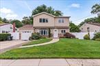 Welcome to 40 Woodland Avenue. Pride of ownership throughout this completely updated 4 level dormered split. Updates include kitchen with stainless steel appliances, 200 amp electric panel, high efficiency Bosch gas burner system with tankless hot water. Dormered oversized primary suite with walk in closet and full bathroom. Spacious family room with large crawl space storage. Located in quiet neighborhood with close proximity to Farmingdale College, Bethpage Golf Course, fabulous restaurants and the train station. Award winning school district Half Hollow Hills.