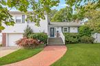Beautiful Split Level situated in Massapequa Park, quiet mid-block location, adjacent to park, features great curb appeal w/brick & vinyl sided ext. w/vinyl soffits, leaders & gutters, double cement driveway, brick walkway, bluestone stoop & steps w/PVC railings, Foyer, open concept Great Rm feel, updated Eat-in Kitchen w/center island/breakfast counter, granite countertops, mirrored & ceramic tile backsplash, upgraded stainless steel appliances, Viking gas stove, sub-zero refrigerator, built-in microwave, vaulted ceiling, hi hats & ceramic tile floor, Formal Dining Rm w/vaulted ceiling, Living Rm w/2 skylights, hi hats, refinished h/w floors & sliding French doors to backyard, Upper Level features Full Bath w/marble & ceramic tile, skylight, hi hats & Jacuzzi tub, Master Bedroom w/hardwood floors, double mirrored closet & ceiling fan, MBR Full Bath w/ceramic tile, 2 other Bedrooms w/hardwood floors & ceiling fans, 1st Floor Den w/wall-to-wall carpeting & hi hats, Full Bath w/ceramic tile & pedestal sink, Laundry Room w/washer & dryer, Basement part, finished Family Rm w/wall-to-wall carpeting, Utility Rm, Cedar Closet & plenty of other closets & storage, newer central air, windows tilt-easy clean, 1 car attached garage w/electric garage door opener, gas heat, separate hot water heater, 2 zone heat, priv. Fenced backyard, 6ft PVC fencing, Trex deck, shed, semi-inground pool, underground sprinklers front & back, convenient to all transportation & shopping.