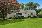 Located minutes away from the heart of downtown Hampton Bays, this 3-bedroom, 2.5-bath home offers an unbeatable combination of convenience, comfort, and potential. Enjoy immediate access to Starbucks, restaurants, shops, the grocery store, and direct access to Good Ground Park, offering trails, community events, and playground activities.The main level features a bright, open-concept living and dining areaâ€”perfect for entertainingâ€”alongside a spacious eat-in kitchen. The primary bedroom includes a private half-bath, while a full hallway bathroom serves the secondary bedrooms and main living area with ease. A fully finished basement adds valuable flexible space for a media room, gym, office, or guest overflow, and includes an additional full bathroom.Outside, the expansive backyard and two-level deck are ready for summer hosting, lounging and summer meals â€” with plenty of room to add a pool and transform the space into a true Hamptons retreat. Whether you&rsquo;re looking for a new primary residence, weekend escape, or investment opportunity, this well-located move-in-ready delivers outstanding access to the best of Hampton Bays - with the space, flexibility, and setting to make it your own.