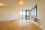 Enter this well-kept condo in Woodhaven Towers, a sought-after 7-story building constructed in 2007 with 74 units, elevator service, in-unit washer/dryer, and optional on-site parking . This desirable unit offers a bright and efficient layoutâ€”ideal for comfortable city living. Residents enjoy exceptional convenience, located just steps from the Woodhaven Boulevard subway station (R, M, and late-night E & F lines), and within walking distance of Queens Center Mall, vibrant shops, restaurants, and major transit routes Situated in School District 24, it provides access to P.S. 102 Bayview (Kâ€“8), I.S. 73 (Grades 6â€“8), and Newtown High School (Grades 9â€“12) This is an outstanding opportunity for homeowners, commuters, and investors seeking a well-maintained, transit-oriented Elmhurst residence.