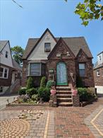 Charming Tudor style home in a fabulous location. Enter through a lovely foyer to open living space, 1st floor features kitchen living room and formal dining room, 2 Bedrooms and 1 full Bathroom. 2nd floor features another  Ful Bathrom and 2 bedrooms that can easily be converted to 3 bedrooms. Full basement with laundry room washer/ dryerOutside backyard has a patio deck and above ground pool. 1 car detached Garage with driveway parking good for 4 cars