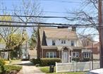 OPPORTUNITY KNOCKS! Double Brick One Family 2, 500 SF Home With Great Bones. This Home Features A Enclosed Porch, Two Car Garage. Full Basement, And Secret Walk Up Attic Disguised As A Bookshelf!!! This Home Is Also On A Subdividable 8.543 SF Lot. Per Architect You Are Able To Build Multiple One Family Homes or One Large 6, 400 SF Home. R2A Zoning. This Home Is In Very Close Proximity To Bell Blvd Restaurants, Bay Terrace Shopping Center, Crocheron Park, LIRR Train Station, Local and Express Bus Transportation, and Bayside Marina. The Home Also Backs The Prestigious Bayside Gables. A MUST SEE!
