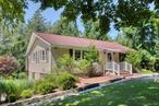 Charming and private home in Green Acres in Orient Point. Open floor plan with dining room/kitchen opening onto lovely second floor deck. The living room and rear deck have open views of 63 acres of pastoral undeveloped preserved land. Association sound beach down the road.