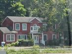 Spacious Colonial home located in the heart of Lake Grove within the Three Village School District. Featuring 5 generous bedrooms and 2 full bathrooms, this property also offers a full finished basement with high ceilings and excellent ventilation. The first floor has potential for business use with proper permits. Expanded garage and a paved driveway (2014) that accommodates up to 8 cars. Conveniently located steps from shopping centers and close to all major amenities. Ideal for both comfortable living and possible home business. Just need some TLC.