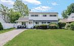 Beautifully Maintained Colonial in the Heart of HicksvilleThis spacious and meticulously cared-for colonial sits on a generous 60 x 100 lot and offers approximately 2, 150 square feet of comfortable living space. The main level features a renovated kitchen with sleek stainless steel appliances, flowing seamlessly into an expansive open-concept living and dining areaâ€”perfect for entertaining. An additional family room and a full bathroom provides flexible space for guests or everyday relaxation.Upstairs, youâ€™ll find 4 well-proportioned bedrooms and a large, updated full bath. Gorgeous hardwood floors run throughout, adding warmth and character to this inviting home. Tons of closets throughout. Step outside to a large backyard with plenty of potential - ready for your personal touch to transform it into the outdoor oasis of your dreams. A wonderful opportunity in a desirable Hicksville location, blending classic charm with modern updates.