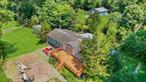 BEAUTIFUL EXPANSIVE 5 ACRE PROPERTY WITH RIVER VIEWS AND RIVER FRONTAGE ON THE DELAWARE RIVER! Whether looking for a year-round home or fun weekender this home and property will not disappoint. Walk into an amazing ranch home that features a delightful kitchen with granite countertops, a large kitchen island so nice for cooking space and to enjoy yourmeals at, a wood fireplace - Dual sides one in dining room and other side for living room, kitchen open floor plan to a cozy dining room with a ductless A/C Unit that can cool or heat and a pellet stove, spacious living room, 2 baths,  2 comfortable bedrooms and a large primary master and luxury bathroom, and in addition, by kitchen area is a long utility room for laundry that has an entrance into a large storage space. Outside amazing entertaining happens with BBQ&rsquo;s on the large front paver patio, fire pit, lawns to enjoy field games in additionto the lengthy front deck to enjoy visiting on and especially to enjoy the River Views that usually are enhanced with views of the river activities on the PA side of the river as well. Great opportunity to enhance your lifestyle in this beautiful area with living along the river and being creative with the property that has so much potential including the huge pole barn and gardening area with private acess to it - you have to really see all to appreciate it!