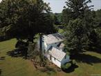 Wake up to 85 acres of green glory overlooking Lemon Brook Pond. History, comfort, tranquility, all the unique features this 1840&rsquo;s Farmhouse has to offer. Nestled behind the gates of Valley Brook Farm lies this beautiful historic home. It has been recently remodeled to include new windows, all new stainless steel appliances, all new electric, insulation, well tank, kitchen, bathroom & flooring. Home has a beautiful wood burning stone decorated fireplace. Original hardware on door and some antique items used back in the day in bedrooms. Bedrooms are decent size with wood coverings. Basement has separate access currently in the plans to be updated. Spacious door porch overlooking Lemon Brook Pond. Separate stand alone oversized 2 car garage with lawn equipment and unique items that are negotiable in sale. Attic space inside garage. Other use of current land aside of farming: subdivision of property can be considered by town for residential use. A minimum of 3 acres allowed to build a separate stand alone house. Any other use is to be considered and submitted to the planning board. The town of Bethel is known for many lakes including Kauneonga Lake. Shops and restaurants along the lake to enjoy scenery and ambience. The Town of Bethel was brought to the world&rsquo;s attention in 1969, when nearly 500, 000 people gathered at Max Yasgur&rsquo;s farm for Three Days of Peace and Music. The documentary made about Woodstock released in 1970 showed interviews with numerous Bethel residents, including Art Vassmer, co-owner of Vassmers General Store in Kauneonga Lake. Loads of history and still about 2 hour drive from NYC. Don&rsquo;t miss out your opportunity to not only own a unique Farmhouse but also be part of a growing town and or development!!! Boating, hiking, hunting, parks.... etc... see yourself here?!