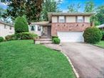 Welcome to this beautiful split-level home nestled on a quiet, tree-lined street in the Herricks School District. Step into a spacious and sun-drenched living room that flows seamlessly into the formal dining room and a large eat-in kitchen with generous counter space and access to the backyard. Just a few steps down, you&rsquo;ll find a comfortable and welcoming den, a half bath,  and access to the two-car garage.Upstairs features a spacious primary bedroom with an ensuite bath, along with two additional bedrooms and a second full bathroom. Additional highlights include a finished basement/bonus space with a laundry area, hardwood floors throughout the home, new water heater and new washer/dryer.Ideally located close to shops, dining, major highways, and public transportation, this home presents an incredible opportunity to settle into one of Nassau Countyâ€™s most desirable neighborhoods.