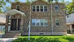 This truly one-of-a-kind 2-family home is among the largest you&rsquo;ll find, boasting an impressive 3, 700 square feet of living space on a 50 X 100 lot. Inside, you&rsquo;ll find a huge living room and a spacious dining room, along with an eat-in kitchen featuring a large island. There are four generously sized bedrooms, including a master suite complete with a walk-in closet and a luxurious bathroom. The second-floor apartment offers cathedral ceilings and bedrooms with skylights, adding even more charm. Plus, there&rsquo;s a private driveway and a one-car garage for your convenience.