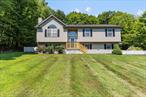 Tucked away on 2 wooded acres in the artisian hamlet of Cragsmoor is this charmer, ready and waiting for its new owners. This home, with glistening hardwood floors throughout the main level, has been recently and lovingly updated with a brand new kitchen featuring a fabulous Boos butcher block center island with seating, soft close two toned cabinets with glass fronts, indestructible Dekton countertops, stainless steel appliances and a modern farmhouse sink. The kitchen flows to the adjacent dining area which looks out to the deck and the wood-scape beyond. The living room is bright and spacious and features a wood burning fireplace with a brilliant blue tile surround, a large Palladium window to let in scads of natural light and a vaulted ceiling with recessed lighting. The primary suite is warm and welcoming, with a newly renovated en suite ensuring relaxation and privacy. The bedrooms all have large closets and center lights/fans. The lower level is tastefully finished with a large family room, a few bonus rooms for crafts, a home office, exercise or guest spaces, a full bathroom and a convenient and functional laundry room. Outside you&rsquo;ll find a large deck with patio area, a screened gazebo for those warm summer nights and a fenced yard for your 4-legged friends. But this property is an experience and extends well beyond the fence! Take a hike to the back and you&rsquo;ll find a spring-fed pond, perfect for eyeing wildlife or enjoying a peaceful moment. Founded in 1879, Cragsmoor is more than beautiful vistas, scenic preserves, historic architecture and world-class outdoor recreation; it offers a quiet serenity like no other place and has a rich history as an artists colony. Edward Lamson Henry lived here and helped found the colony, Charles Courtney Curran had a summer home here, and Dave Cockrum, X-Men illustrator, lived here for much of the 1980&rsquo;s and 90&rsquo;s. A location like this doesn&rsquo;t come on the market very often! Sam&rsquo;s Point Preserve, part of Minnewaska State Preserve Park, is right around the corner and is the highest point of the Shawangunk Ridge. Bear Hill, a 100 acre preserve, is also in Cragsmoor. Close by are some wonderful local farm-to-table restaurants and eateries as well as the Wine Trail, and the towns of Ellenville, Pine Bush and New Paltz for vibrant Main Streets, shopping and errands. 85 miles to Manhattan makes this an ideal weekend getaway or primary residence as NJ Transit, Short Line, and 17/86 are all within a short distance. Pine Bush School District.