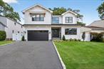 Homes by Jerry Gorgeous new construction in North Bellmore. This sun-flooded colonial with fully landscaped and sodded property with 9-zone inground sprinklers has a covered front entry door with glass sidelights and on into the two-story foyer. This beautiful open-concept floor plan features living room with fireplace, dining room with sliders to the patio and the chef&rsquo;s kitchen featuring Quartz counters, large island with seating, built-in microwave, wine fridge and cabinetry galore. Stainless steel appliances includes 6-burner gas stove. There is a home office/bedroom with full bath on this level as well as a powder room, pantry closets and entry to garage. Upstairs to the sumptuous king-sized primary suite with walk-in closet and spa-bath with soaking tub and two-sink vanity and the shower with a large double-head. Also on this second level is a full laundry room with quartz counters, storage galore and LG washer & dryer. There are two full hall baths and 3 additional bedrooms. There is access to attic via pull stairs. The unfinished basement has 9ft ceilings, egress windows and door to rear property. Additional features include wide-plank oak floors, 80-gallon hot water heater white oak accents, artistic wood panel detail, hi-hat lighting, Hardiplank siding, paver walkways, fully sodded lawn with inground sprinklers and so much more!
