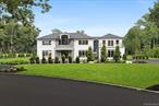 Welcome to 70 Wheatley Road, a newly built 6-bedroom, 6 full and 2 half-bath home on a quiet cul-de-sac in Old Westbury. Set on two acres with approximately 6, 000 sq ft, featuring a finished basement, blending luxury, technology, and craftsmanship.A glass pivot door opens to soaring ceilings, hardwood floors, and natural light from Andersen windows and two-story glass walls. A circular elevator serves all three levels, including the lower level with 11â€™ ceilings, separate entrance, and guest suite.The chefâ€™s kitchen offers radiant heated floors, quartz waterfall island, walk-in pantry, and Wolf, Miele, and Sub-Zero appliances, including a 6-foot wine fridge. The dining room features a butlerâ€™s pantry, while the den offers a gas fireplace, sparkling aromatic waterfall, and walls of glass.The primary suite has dual walk-in closets, fireplace, spa bath with radiant heat, and Juliet balcony. Four additional ensuite bedroomsâ€”two with balconiesâ€”provide comfort and privacy.Energy Star features include a full-house generator, radiant heat in all full baths, 4-zone HVAC, Indirect HW heater, fresh air exchange, Instant hot, water filtration, smart 3-car garage with EV charging, and wiring for a gated entry. Move-in ready with just 25 miles from NYC.