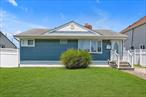 This beautifully updated ranch home is perfectly situated in South Freeport near the Nautical Mile. Close to everything this house is great as a first starter home or if you are downsizing with easy one level living. There are two bedrooms (third bedroom was converted to a spacious formal dining room) great for hosting gatherings, a large kitchen with lovely wood cabinetry and one full bathroom. There is central air, an inground sprinkler system, a garage and a sweeping yard to entertain guests or to just relax in on your chaise. If you enjoy trendy restaurants, you are just seconds away from great dining or you can just enjoy exploring this bustling town. This home is so adorable and affordable, it won&rsquo;t last !