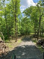 No need to look any further! If you are looking for a beautiful lot, with wind whispering through majestic oaks, birds singing on the branches of lush evergreens, and a seasonal babbling brook...you found it. Almost 9 acres; a short walk to hundreds of acres of State Lands in the Shawangunk Mountains of Ulster County. This shovel ready building lot was Board of Health Approved (2022) for a 5 bedroom residence. Home site cleared and sits down a meandering driveway. The driveway is established and was finished with a considerable base. Disclosure: the listing pictures are from 2022, there is some foliage regrowth due to lack of use, easily brought back, as the major work of clearing the lot, and driveway creation has already been completed. If you are searching for silence and seclusion, a place to hear the sounds of nature at its best, don&rsquo;t miss this opportunity to own your own &rsquo;nature preserve&rsquo;! Being &rsquo;one with nature&rsquo; is less than 2 hours from the GWB. Just 13 minutes from the quaint town of Pine Bush which offers dining, shopping, and all the pampering you might be looking for. Minnewaska and Sam&rsquo;s Point State Parks, Mohonk Preserve, the Village of New Paltz are within a picturesque 30 minute drive. It is rare to find a magical property with all the improvements found at #716. Bring your plans and get ready to build your dream home... NOW!