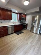 Look no further than this beautifully updated 3 bedroom rental in the heart of Lake Ronkonkoma. Upon entry you will be pleased to find an open concept living room, full kitchen, formal dining room with double French doors to the yard, three bedrooms and a full bathroom with a walk-in shower. Other amenities include private driveway parking & access to the backyard . Close to major roads, shopping & restaurants. NO pets/smoking. NO access to basement. ALL UTILITIES ARE INCLUDED. Landlord requires minimum 650 credit score. Available for immediate occupancy. Month-to-month lease.