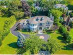 Welcome to 117 Crabapple Rd Manhasset, The Village of Flower Hill. A custom-built home from 2008 with desirable southern exposure. This massive Colonial sits on a flat 1/2 acre lot and offers 4â€“5 bedrooms (including 2 en-suites), 5.5 baths, a formal dining room, family room, living room, office, two-car garage, and a paver patio.The two-story entry foyer with high ceilings leads to exquisite craftsmanship throughout the entire home.Its proximity to parks, the Americana Manhasset shopping center, Port Washington schools, the LIRR, and highway access further enhances its desirability.