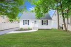 Welcome to this beautifully renovated Expanded Cape in the heart of Glen Head. Featuring 3 bedrooms, 3 full baths, and approximately 1, 774 sq ft of finished and unfinished living space, this home blends timeless charm with modern upgrades. The open first-floor layout showcases a sunlit living room, dining area, and a stunning kitchen with gas cooking, stainless steel appliances, and gleaming Hardwood floors. The finished basement offers an exterior walk-out, luxury vinyl plank flooring, - ideal for recreation, a home office, or guest quarters. Upgrades include an HVAC system, gas furnace with A/C coil, electric hot water heater, 200 AMP electric, plumbing, new roof, siding, hi-hat lighting, and driveway. Outdoor living is complete with a rear deck for entertaining, nice size fenced yard, and a detached 1 car garage with extra storage plus a 4-car driveway. Conveniently located near major routes, LIRR, shopping, dining, and in the award-winning North Shore School District. Move-in ready, bring your offer today!