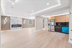 Remarkable and classically renovated brick two family nestled on a beautiful tree lined street of Springfield Gardens. This meticulously renovated property will captivate you from the moment you arrive with its warm & welcoming energy. Offering a 4 bedroom 2 bath rental unit over a 3 bedroom 2 bath owners unit, plus a high ceiling full finished basement with 3 additional bedrooms. Perfect opportunity for buyers looking for space, plus income generating rental property to assist with mortgage payments. Both units feature expansive sun drenched, modern open concept living/dining areas provide great space for entertaining. Jaw dropping chefs granite kitchens equipped with floor to ceiling custom cabinetry & adorned with a full fleet of state of the art stainless steel appliances. Spacious bedrooms equipped with ample closet space. Primary suite equipped with private en suite that boast spa-like finishes. Fully tiled bathrooms adorned with state of the art wall & floor tiles.Renovations include brand new flooring, recessed lighting, central HVAC, electrical, heating, plumbing systems throughout. This masterfully re-imagined two family is conveniently located with close proximity to major transportation which makes commuting a breeze. Short blocks to Springfield Blvd, 147 Avenue, Belt Parkway, JFK Airport, schools, shopping centers, restaurants, cafes, parks and many other vibrant neighborhood amenities.