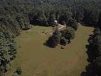 Wake up to 85 acres of green glory overlooking Lemon Brook Pond. History, comfort, tranquility, all the unique features this 1840&rsquo;s Farmhouse has to offer. Nestled behind the gates of Valley Brook Farm lies this beautiful historic home. It has been recently remodeled to include new windows, all new stainless steel appliances, all new electric, insulation, well tank, kitchen, bathroom & flooring. Home has a beautiful wood burning stone decorated fireplace. Original hardware on door and some antique items used back in the day in bedrooms. Bedrooms are decent size with wood coverings. Basement has separate access currently in the plans to be updated. Spacious door porch overlooking Lemon Brook Pond. Separate stand alone oversized 2 car garage with lawn equipment and unique items that are negotiable in sale. Attic space inside garage. Other use of current land aside of farming: subdivision of property can be considered by town for residential use. A minimum of 3 acres allowed to build a separate stand alone house. Any other use is to be considered and submitted to the planning board. The town of Bethel is known for many lakes including Kauneonga Lake. Shops and restaurants along the lake to enjoy scenery and ambience. The Town of Bethel was brought to the world&rsquo;s attention in 1969, when nearly 500, 000 people gathered at Max Yasgur&rsquo;s farm for Three Days of Peace and Music. The documentary made about Woodstock released in 1970 showed interviews with numerous Bethel residents, including Art Vassmer, co-owner of Vassmers General Store in Kauneonga Lake. Loads of history and still about 2 hour drive from NYC. Don&rsquo;t miss out your opportunity to not only own a unique Farmhouse but also be part of a growing town and or development!!! Boating, hiking, hunting, parks.... etc... see yourself here?!