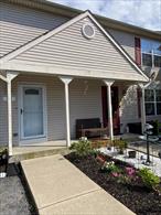 Whether you&rsquo;re downsizing or searching for your perfect home, this affordable townhome in beautiful Warwick, NY offers a blend of comfort, functionality, and lifestyle. Located in a vibrant neighborhood with no HOA fees, you&rsquo;ll enjoy convenient access to shopping, transportation, and the charm of a close-knit community.Step inside to find an open-concept first floor where a modern kitchen and dining area flow onto a quaint deckâ€”perfect for a bistro table and morning coffee. The large, sunlit living room provides a welcoming space to relax or entertain, while a first-floor half bath and coat closet add to everyday convenience.Upstairs, two spacious bedrooms offer generous closet space, including a walk-in in the primary suite. A bright full bath and a dedicated laundry room with washer and dryer complete the second floor, making daily routines a breeze.The finished basement expands your living space, opening to a large wooden patio and backyardâ€”ideal for pets, play, or hosting under the stars. Nestled in the heart of Orange County, this townhome places you moments from quaint villages, farm-to-market stands, nearby wineries, local parks, and scenic hiking trails.With its inviting layout, practical features, and unbeatable location, this home is a true gem at an approachable price point.