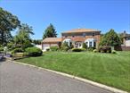 Nestled mid-block on a quiet side street in Nesconset, this expansive 2, 900-square-foot colonial home sits on a beautifully landscaped 0.35 acres filled with exceptional features. The first floor welcomes you with a foyer leading to a formal living room, a formal dining room with a butler&rsquo;s pantry, a half bathroom, and an eat-in kitchen and den with a fireplace, both overlooking the yard, as well as a laundry room. The second floor features three generously sized bedrooms and a primary bedroom with a walk-in closet and a full bathroom. The finished basement is perfect for guest quarters or entertainment, equipped with a large wet bar, a full bathroom, and two additional rooms. Outdoor amenities include a spacious pavered patio surrounding a 16 x 32 in-ground pool, an outdoor kitchen with a sink, fridge, and grill, two pergolas for entertaining, and a hot tub. Additional updates and features include split air conditioning and heating in the garage, solid surface flooring throughout, crown and base molding, newer appliances, and two split-zone air conditioners/heaters in the basement. Located within the Smithtown School District, this property offers easy access to major roadways, shopping malls, and centers, with taxes totaling only $15, 061.40.