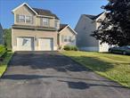 WASHINGTONVILLE SCHOOLS - 3 + BEDROOMS, 3.5 BATHROOM HOME - 2728 SQ. FT. FOR SALE. Affordable spacious home in Woodfield development! Home featuring three levels of living space. Impressive and welcoming 2-story foyer. Formal living/dining area and vaulted ceilings with plenty of sunlight. Efficient style and inviting warmth in the kitchen with ample storage and counter space. Spacious & comfortable family room with gas fireplace. Half bath and laundry room complete the first floor. Comfort & coziness characterize the private primary bedroom suite with bathroom and walk-in closet. Two more bedrooms are bright & roomy and share the second full bathroom on second floor. The lower level offers a family room, full bathroom with shower and home office/den...plus storage area. The above ground pool and the tiered deck is backed by forever green area and makes for an open airy space, perfect for hosting all year around gatherings. Walking distance to village shops, restaurants and local park and the very charming oldest winery in the country!.. Convenient commuter location: minutes to Metro-North train station, buses to NYC and major highways.